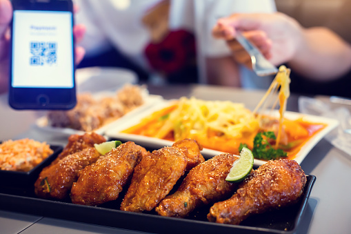 Choosing variety of dishes through the digi menu.