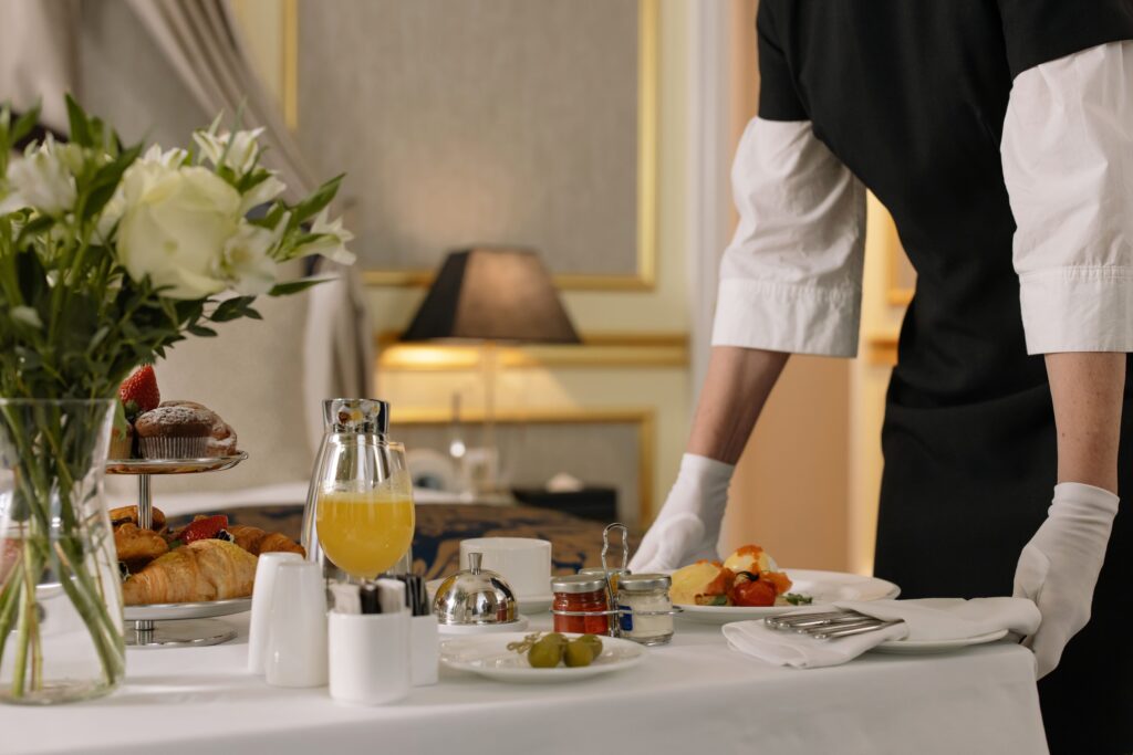 Hotel staff serving food